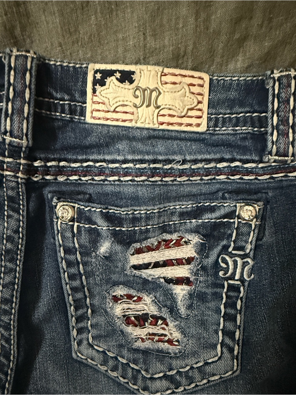 Miss Me Blue Distressed Denim Jeans with Flag Patch Detail